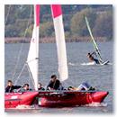 ... perfect yachting course. A six-year old boy controls the rudder!